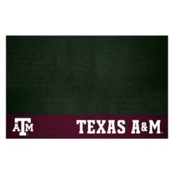 FanMats® 12111 - NCAA Texas A&M University 26" X 42" Grill Mat With "ATM" Logo & Wordmark