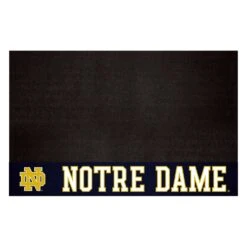 FanMats® 13323 - NCAA Notre Dame University 26" X 42" Grill Mat With "ND" Logo & "Notre Dame" Wordmark